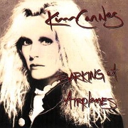 Barking At Airplanes by Kim Carnes
